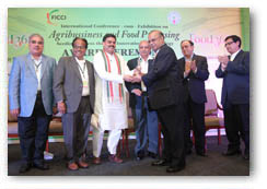 Also seen in the photo (Left to Right): Mr. Shivkumar - FICCI, Mr. J. A. Choudary - FICCI, Mr. Nadendla Manohar - Hon'ble Speaker, Legislative Assembly, Government of Andhra Pradesh, Mr. I. Y. R. Krishna Rao (I A S, Special Chief Secretary - Agri Marketing, Go AP), Mr. Kali prasad, and Mr. Kapil Mohan