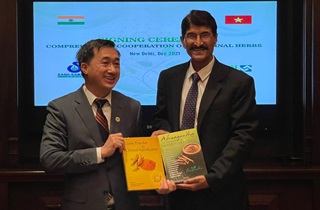 Gifted Books to Prof. Tran V Thuan, Dy. Minister of Health